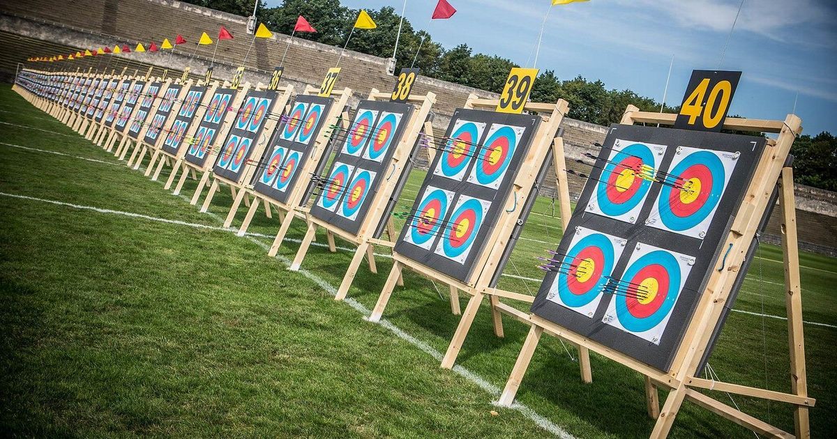 A row of archery targets at an outdoor range